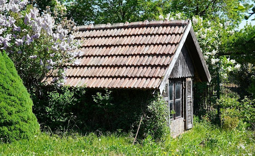 Tile roof shed in garden