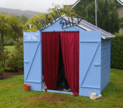 Blue cinema shed with curtains